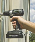 Person using Genesis 20V Cordless Drill Driver With Three Eighths Inch Chuck And Built In LED Work Light Dual Speed Ranges Goes Up To 250 In Lbs Torque Includes 20V Battery Charger And Double Ended Screwdriver Bit For Quick Jobs on metal surface outdoors