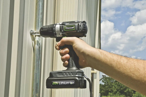 Person using Genesis 20V Cordless Drill Driver With Three Eighths Inch Chuck And Built In LED Work Light Dual Speed Ranges Goes Up To 250 In Lbs Torque Includes 20V Battery Charger And Double Ended Screwdriver Bit For Quick Jobs on metal surface outdoors