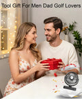Couple exchanging gifts with Magnetic Cruise Golf Cart Fan 10000mAh Portable Cooling Buddy on table, ideal birthday gift for men.