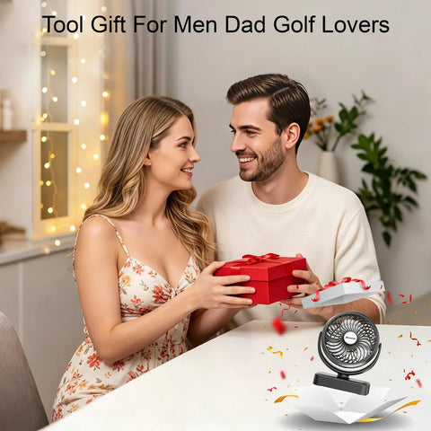 Couple exchanging gifts with Magnetic Cruise Golf Cart Fan 10000mAh Portable Cooling Buddy on table, ideal birthday gift for men.