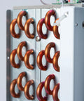Close-up of copper coils in fresh drinking water from air generating up to 18 gallons a day with multi stage filtration unit.