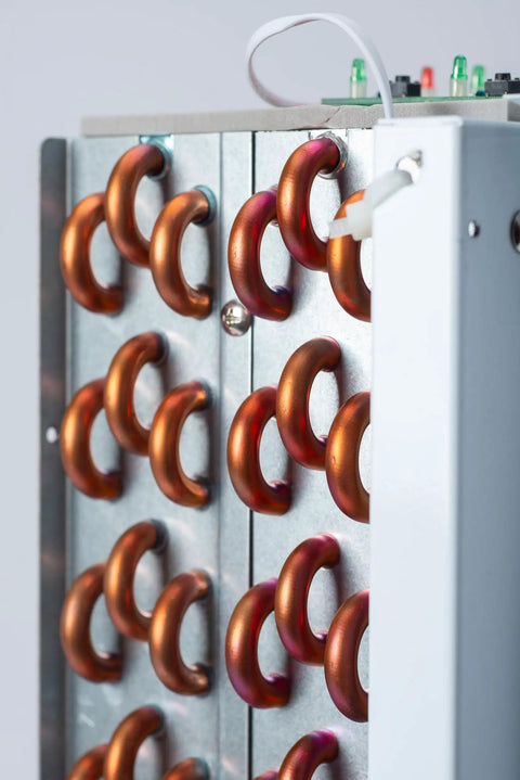 Close-up of copper coils in fresh drinking water from air generating up to 18 gallons a day with multi stage filtration unit.