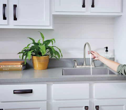 Parkwood Two Handle Kitchen Faucet Deck Mount in Stainless with Aerated and Spray Options, ADA Compliant, in modern kitchen setup