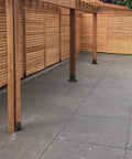 Heavy Duty Black Powder Coated 4 By 4 Post Base Set Of Five For Deck Pavilion Railing Support Bolt Down Inner Size Three Point Six By Three Point Six Inches 14 Gauge Steel Brackets Built For Sturdy Outdoor Use showcasing mounted posts on concrete.