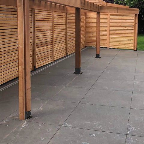 Heavy Duty Black Powder Coated 4 By 4 Post Base Set Of Five For Deck Pavilion Railing Support Bolt Down Inner Size Three Point Six By Three Point Six Inches 14 Gauge Steel Brackets Built For Sturdy Outdoor Use showcasing mounted posts on concrete.