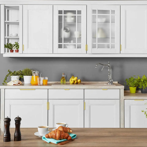 Premium Gold Cabinet Handles Finger Edge Pulls Sleek Brushed Finish on white kitchen cabinets with coffee and croissants.