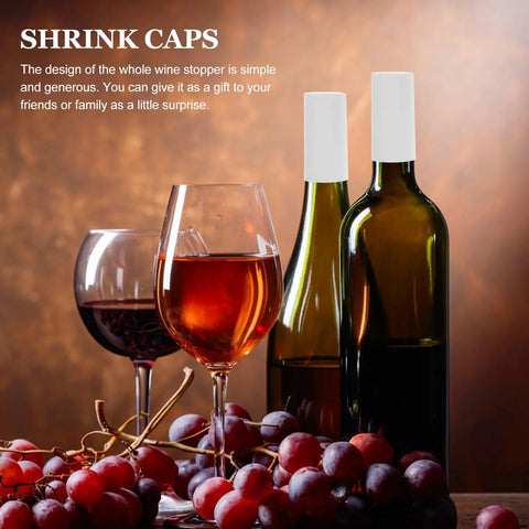 Snag These White PVC Heat Shrink Wine Bottle Caps A Dope One Hundred Pack To Keep Open Bottles Fresh With An Airtight Seal That Kills Oxidation Cold Zero Fuss Just Heat For A Snug Fit Around Any Neck Sweet For Weekend Sipping Or Quick Stashing, shown on wine bottles with glasses and grapes.