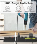 Person using drill with Built Tough Heavy Duty 20 Amp Power Strip With 6 Widely Spaced Outlets High Amp Surge Protector tabletop