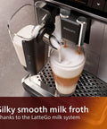 Top Tier Fully Automatic Espresso Machine Boasting A No Fuss LatteGo Milk Frother For Eight Rich Brews and a sleek matte black interface preparing milk froth.