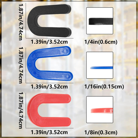 Heavy Duty Vehicle Lift Leveling Shim Kit With Grippy Polyethylene Wedges showing black, blue and red wedges, various sizes and shapes.