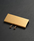 Brushed Gold Aluminum Alloy Concealed Drawer Pulls 2 Pack For Cabinets And Doors, 80mm Flat Finger Pull with screws on dark background
