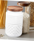 Two Pack Glass Storage Jars With Secure Airtight Lids For Coffee Beans And Dry Goods Keeps Your Stash Locked Down Tight, featuring white textured design.