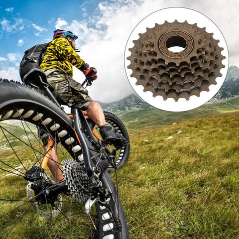 Cyclist on mountain trail with inset of Six Speed Freewheel 14T-28T Wear-Resistant Bicycle Cassette for Mountain Bike Replacement Sprocket Kit