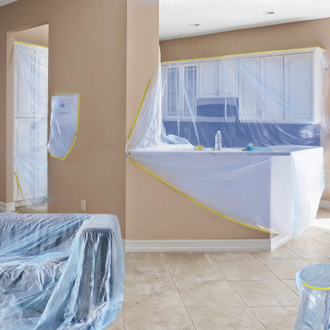 Room with blue masking film on kitchen counters using Masking Paper With Tape 6 Pack For Automotive Painting And Home Projects Heavy Duty