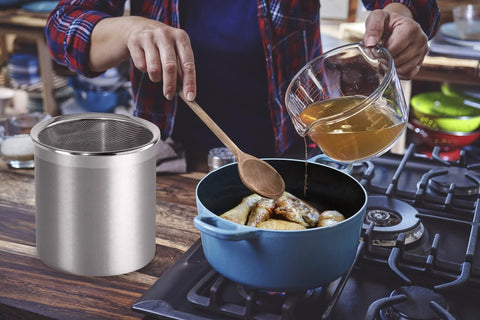 Stainless Steel Jumbo Grease Container With Removable Strainer And Snug Lid next to person pouring oil into pot on stove
