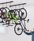 Ceiling Mounted Bike Rack for Garage Heavy Duty Indoor Metal Bike Hanger with 8 Adjustable Hooks holding multiple bikes in garage