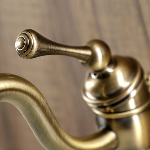 Detail of Victorian Mono Block Bathroom Faucet In Antique Brass With Drip Free Cartridge and 6 Inch Spout Reach