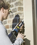 Person using Beige Window Door And Siding Sealant 10 Oz Tubes Advanced Formula Weatherproof Exterior Caulk For Home Gaps