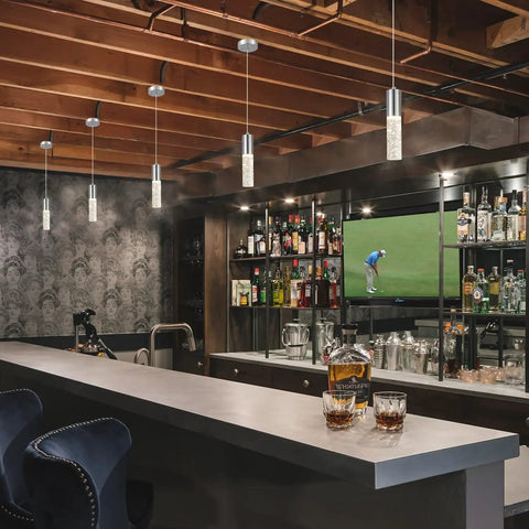 Pendant Lights For Kitchen Island 2 Pack Dope Modern Crystal Cylindrical Hanging Bar Lights illuminating a stylish bar area.