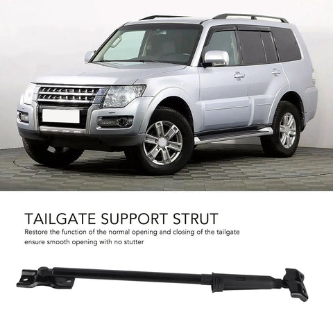 Heavy Duty Tailgate Support Strut For Mitsubishi Pajero Replaces OEM 5822A001 installed on silver SUV with robust design.