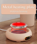 Keep Your Daily Brew Sizzling Hot This Smart Coffee Mug Warmer Uses An Ultra Smooth Metal Heating Base With Gravity Activated Control For Zero Fuss Desk Enjoyment. Close-up of the metal heating plate with red heating indicator.
