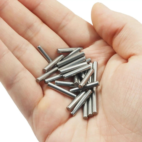 Hand holding 100 Pack 304 Stainless Steel Dowel Pins M3 X 18mm Shelf Support Pins for Bookshelves, Cabinets, and Closets