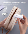 Clip On Rechargeable Book Light For Late Night Reading With Amber And Warm White Glow, shown held next to a beige pouch.