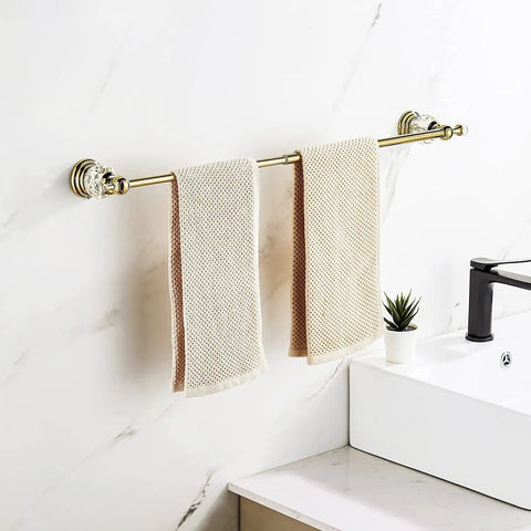 Gold Crystal Bathroom Accessories 4 Piece Set With Towel Bar Adjustable From 18.5 To 30.8 Inches, mounted with towels