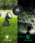 Outdoor LED Spotlight With Dusk To Dawn Sensor, 120V 12W 4000K, 1150 Lumens, 180 Degree Adjustable Head on lawn and bushes