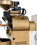 Commercial Drum Coffee Roaster Machine With Digital Temperature Control And Rapid Cooling System For Cafe Roastery And Specialty Coffee Bean Roasting Pro Grade Kitchen Equipment, featuring a metal drum and control dials.