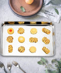 18 Inch Stainless Steel Baking Sheets Set Of 2, Commercial Grade Bakeware, with cookies on mirror finish tray