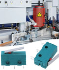 6 Pack KW4-3Z-3 Micro Limit Switches With Hinge Lever Actuators for CNC Mills, close-up view of green switch and machinery background