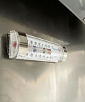 Digital thermometer installed in the Straight Up Tough Commercial Reach In Two Door Freezer with visible temperature scale.