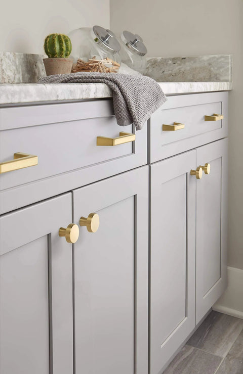 Champagne Bronze Cabinet Pull Blackrock Finish, 3 Inch Center To Center, Overall Length About 3.69 Inches, 1 Pack installed on gray cabinets