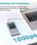 No Fuss Portable M.2 NVMe SATA SSD Enclosure USB 3.2 Type C 10Gbps beside a MacBook showing fast data transfer capabilities.