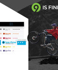 Cyclist performing a wheelie on a trail with mountain backdrop and Prime 9 rating overlay