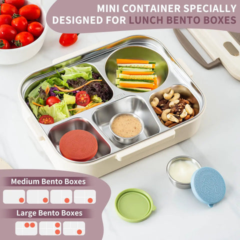 Eight Pack 1.6 Oz Portable Salad Dressing Containers With Lids Leakproof Reusable Stainless Steel Sauce Cups for lunches on a tray