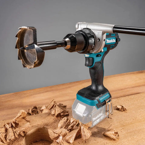 Badass 18V Brushless Drill Driver Boasting Killer Torque And A Slick Compact Frame With 21 Clutch Settings Plus Dual Speed Switches For Serious Trade Jobs Ahead, showing auger bit and wood shavings.