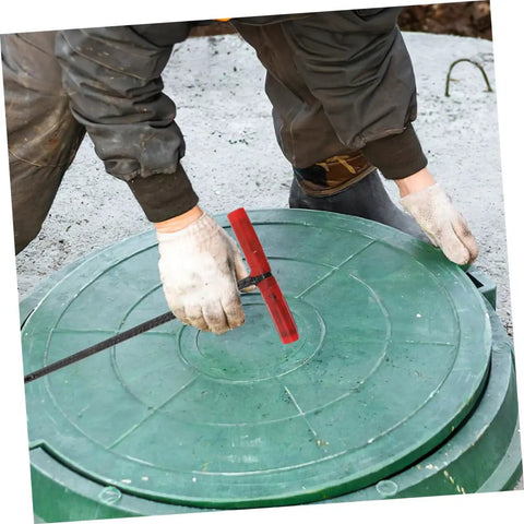 Rock Solid T Shaped Manhole Cover Lifter Hook Forged From Reinforced Steel Rod With A No Slip Grip for lifting green manhole cover.