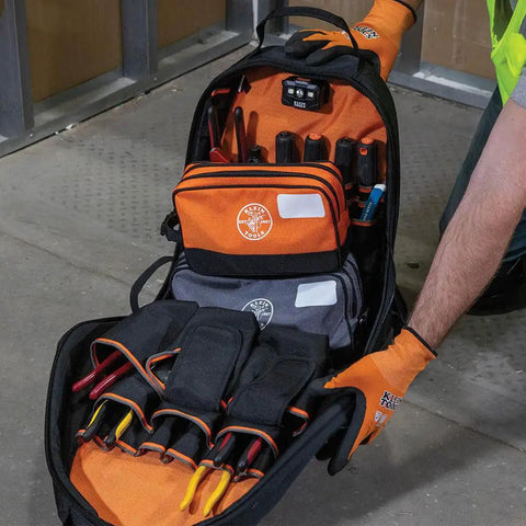 Dual Compartment Tool Pouch Heavy Duty Tool Bag Organizer showing organized tools in orange and gray fabric compartments