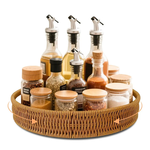 Go To 12 Inch Rattan Lazy Susan Organizer Rotating Serving Tray With Handles for Kitchen Counter displayed with spices and oils