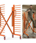 Heavy Duty Expandable Paint Drying Rack For Cabinet Doors With Smooth Casters And Hella Solid Steel Frame For Commercial Millwork And Serious Woodworking Projects Daily in workshop setting.