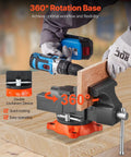 5 Inch Bench Vise With 360 Degree Swivel Locking Base And Anvil clamping wood, secured by ductile iron construction.