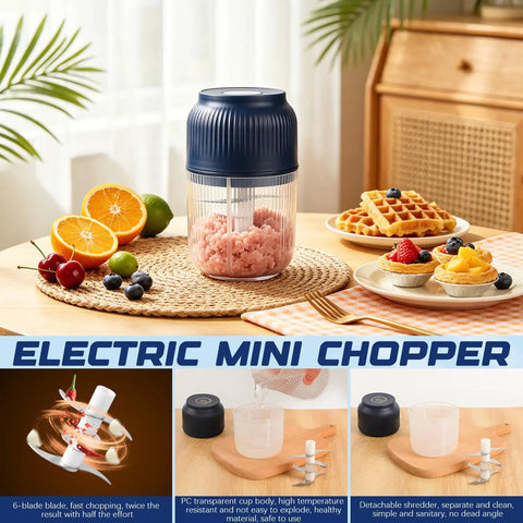 Portable Cordless Electric Garlic Chopper And Vegetable Dicer With 400ml Capacity For Onions Ginger Peppers on a table with fruits.