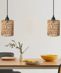 Totally Cordless Boho Rattan Battery Chandelier With A Super Chill Warm White Glow, Handwoven Hanging Pendant Light For Decks Patios Gazebos Or Cozy Indoors, Works Great On 4Aa Batteries Set Of Two over a dining table.