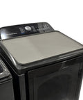 Washer top protector mat 26x18 in, dark gray silicone, non-slip waterproof top-load cover installed view