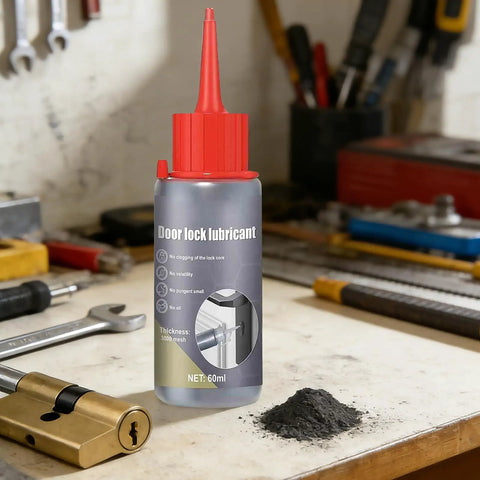 Door lock lubricant bottle with red cap on workshop table, graphite powder and lock cylinder nearby, tools in background.