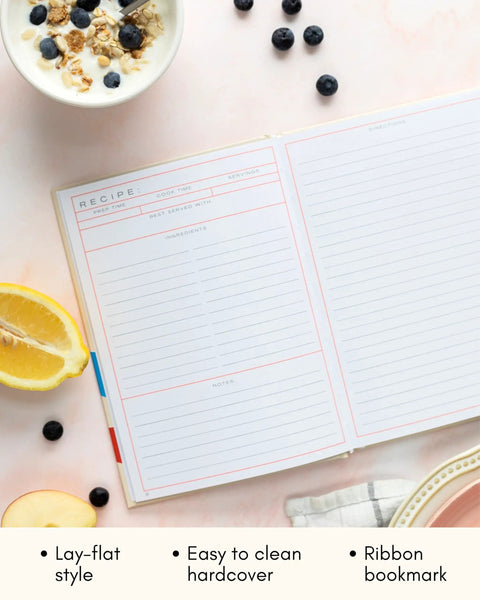 Open Blank Recipe Book To Write Your Own Recipes For Family Keepsakes Durable Hardcover Cookbook Journal with surrounding fruits.