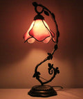 Pink Tiffany Style Stained Glass Table Lamp With Metal Leaf Base, Cozy Desk Reading Light, lit in a dimly lit room, UL Listed, S701 Series.