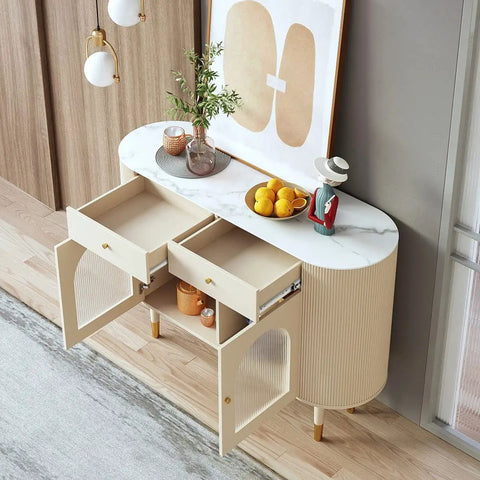 Top view of modern cabinet with two open drawers, displaying interior storage space on wooden floor next to wall art and decor items.